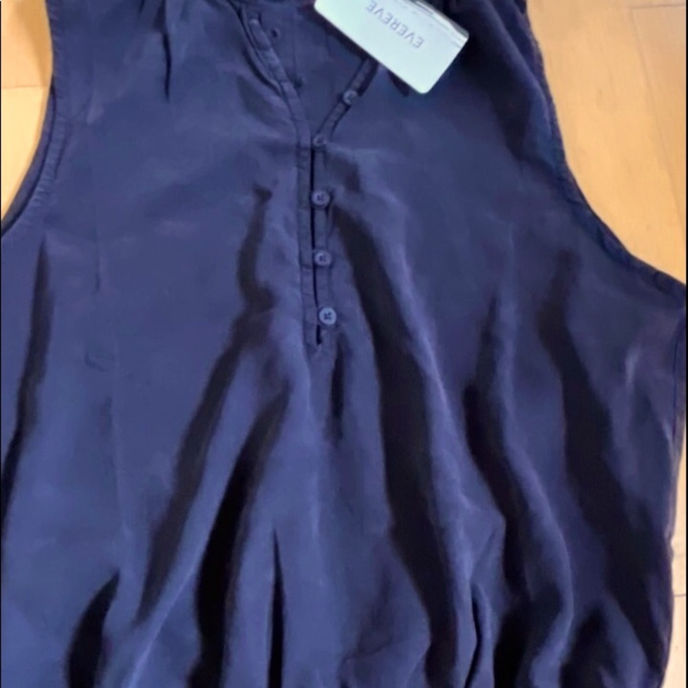 Black tank top with some buttons. Very new with tag still form Evereve